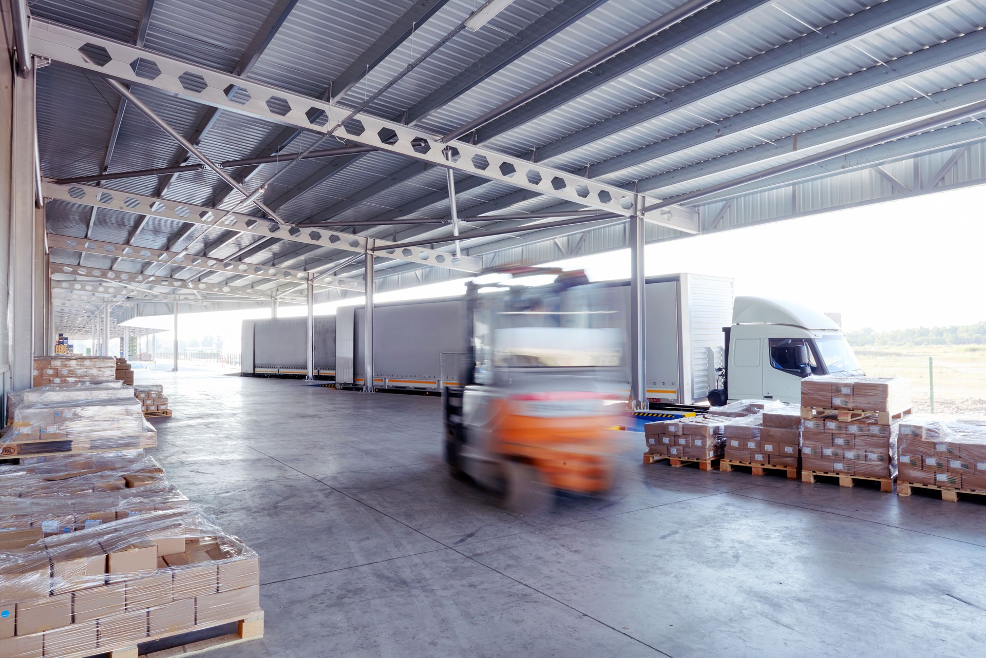 Forklift truck loading lorry